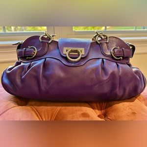 Salvatore Ferragamo 
Marisa purple leather
17”x4.5”x9”
Top handles